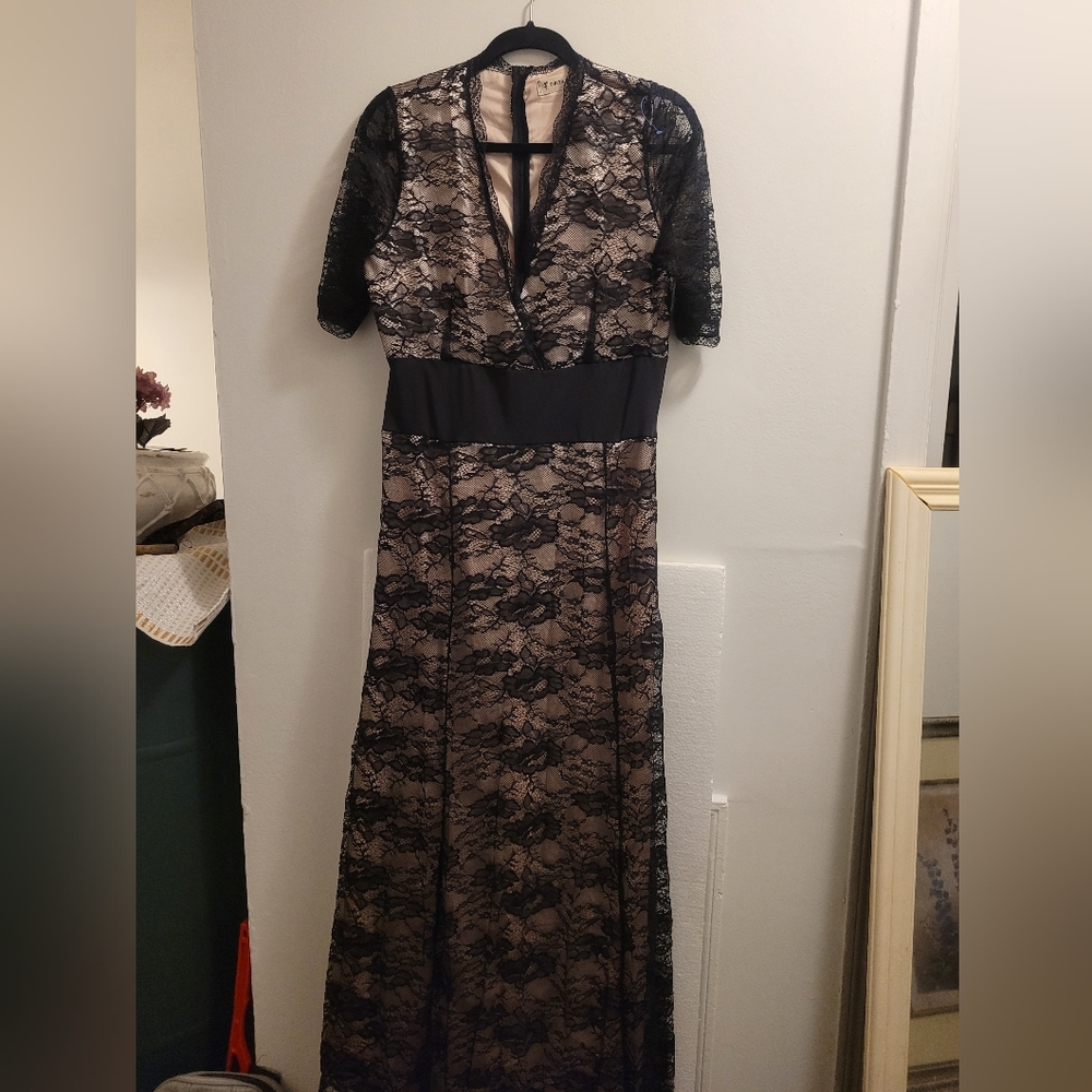 O.Riya Xuan Black lace dress with plunging neckline, shirt sleeve, formal wear